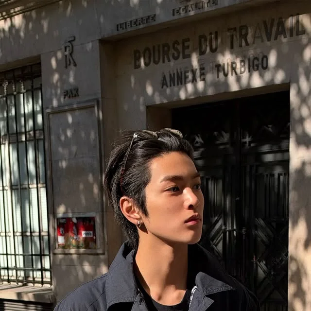 An outerwear-led public off-stage look from CORTIS's official Paris Instagram post