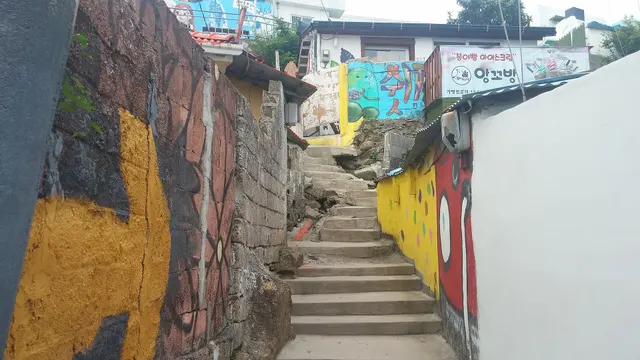 Painted steps in a narrow Dongpirang alley